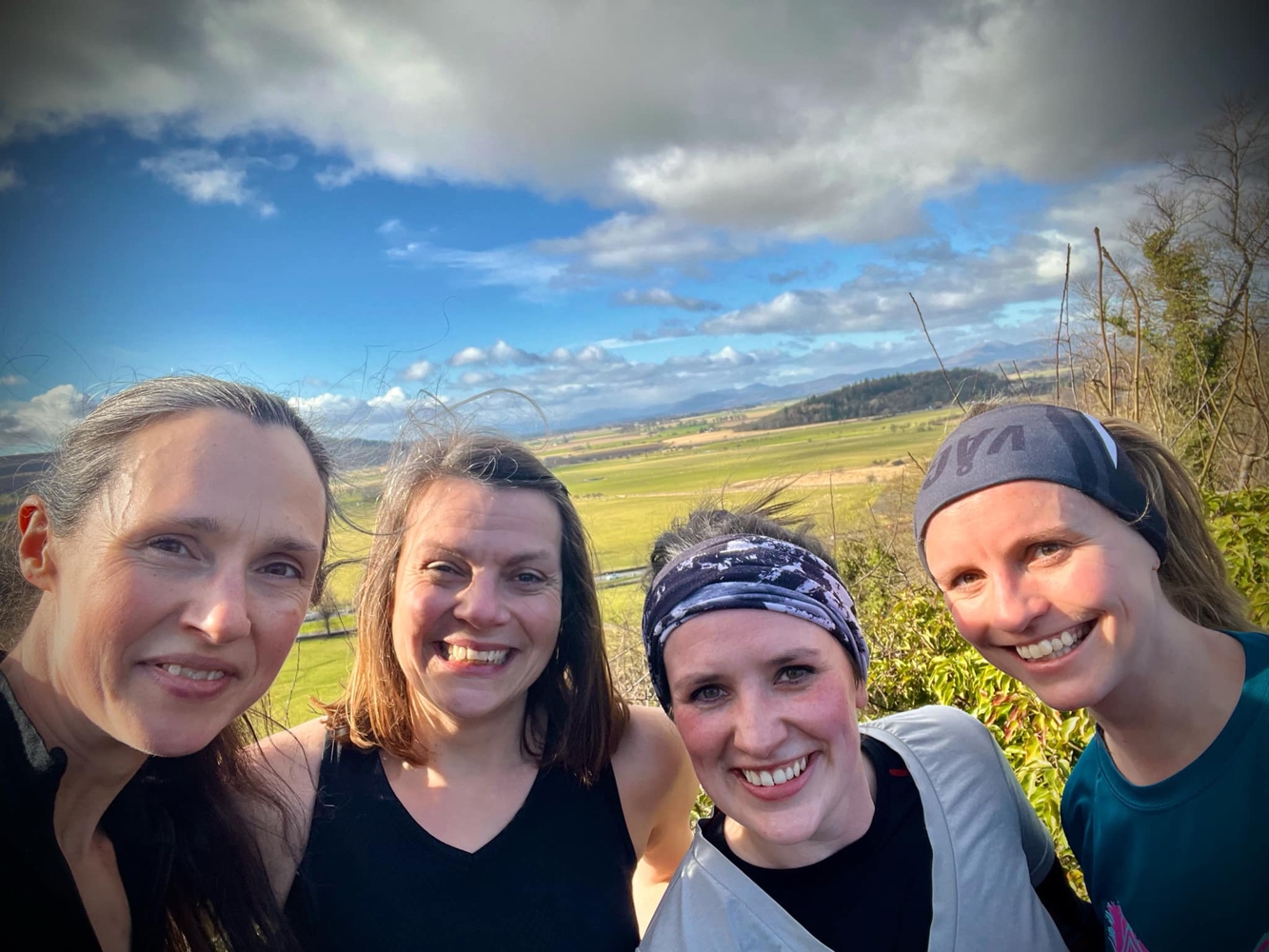 Women smiling during a run