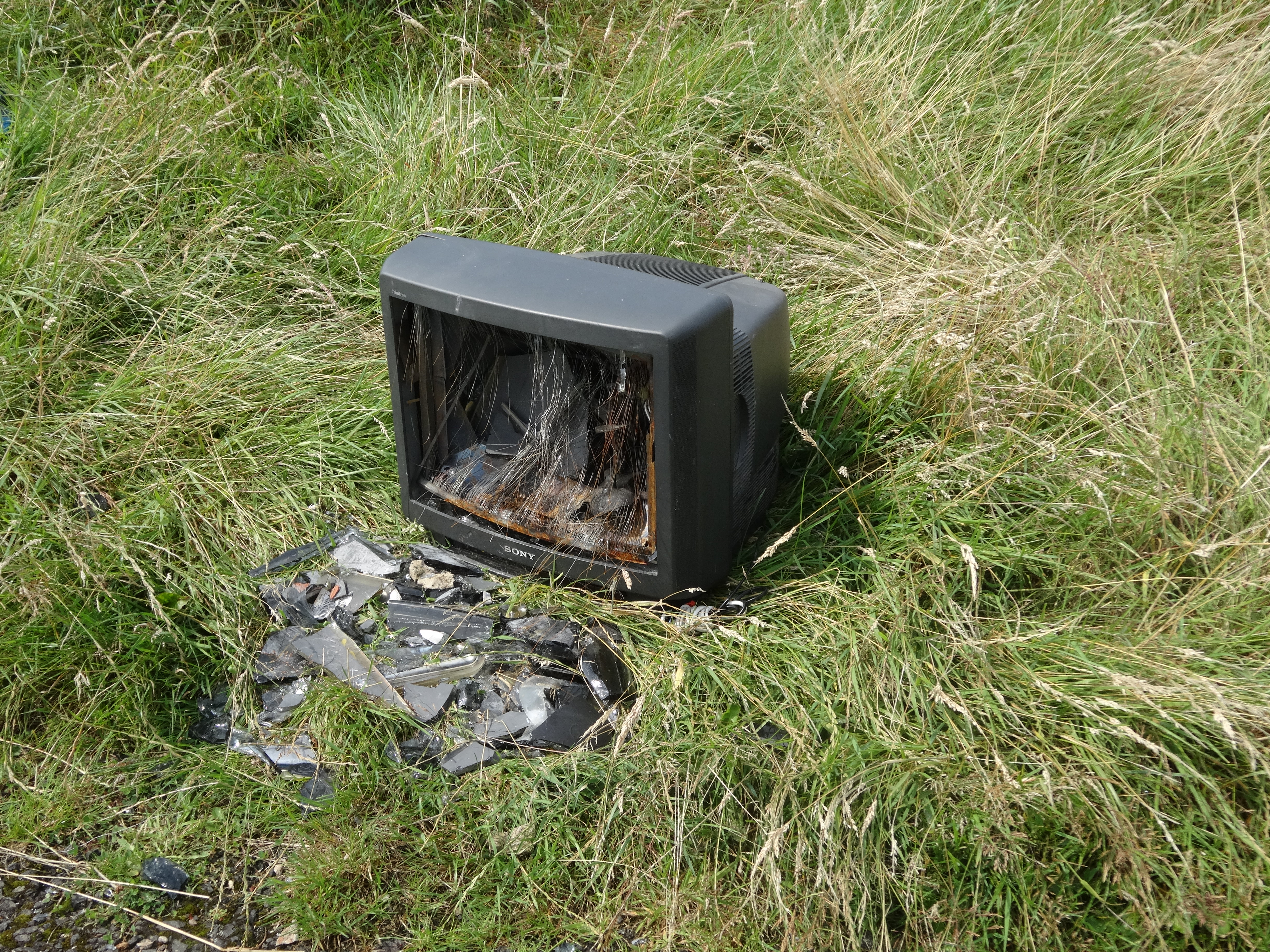 A smashed TV that's been flytipped