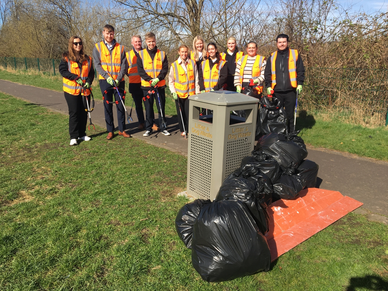 A group of people doing a litter pick