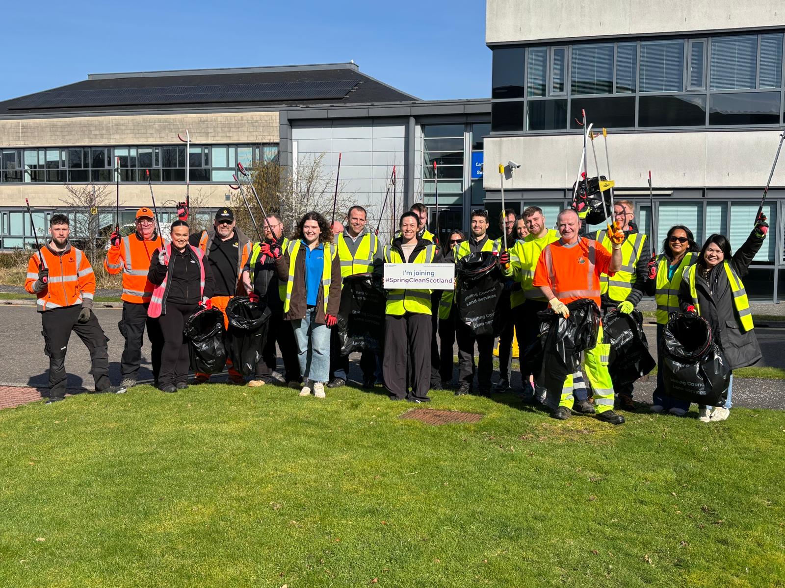 People posing after a litter pick in Stirling
