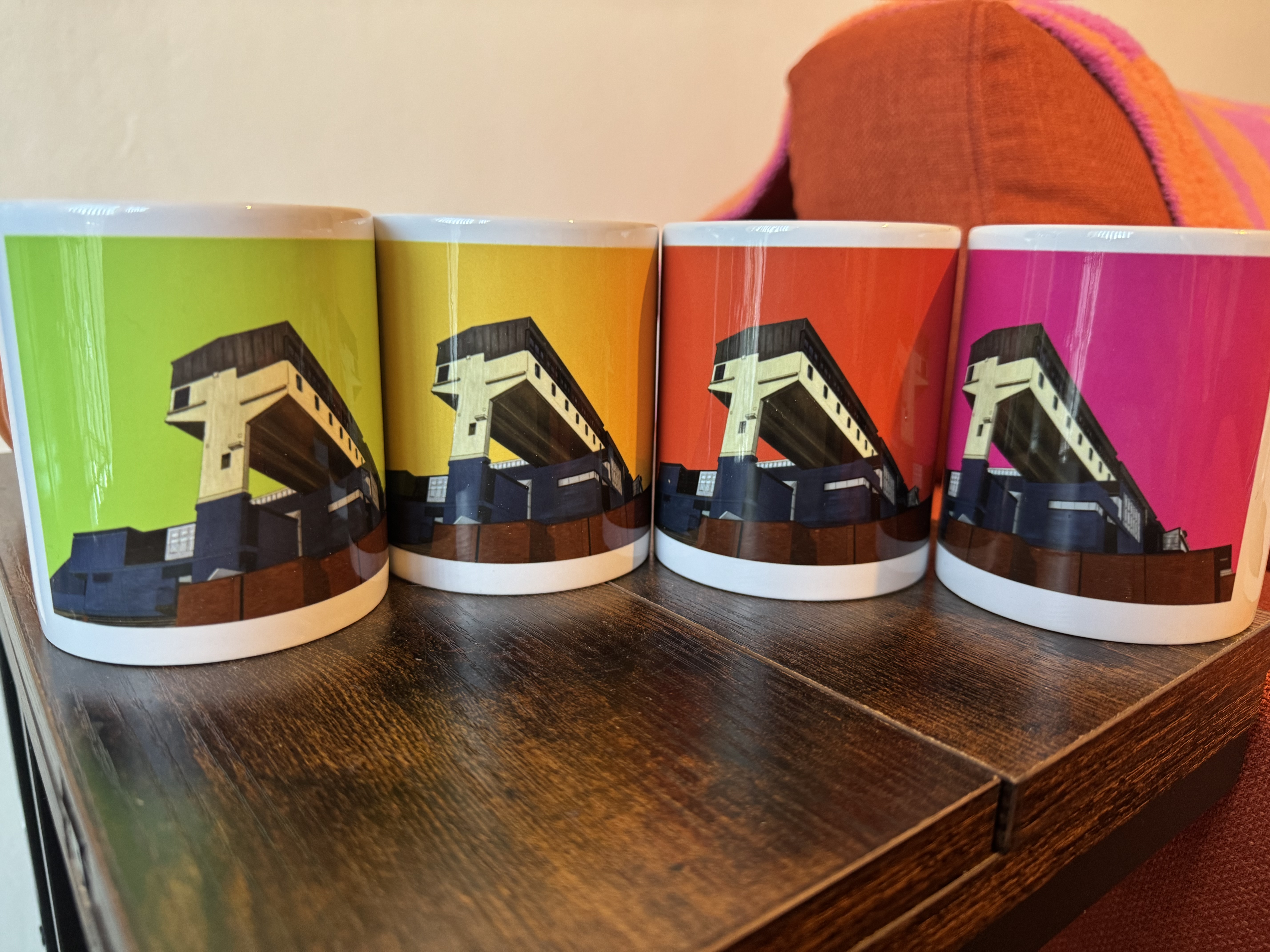 Four of Caroline's mugs, inspired by Cumbernauld